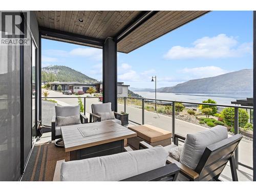 3643 Wild Rose Road, Kelowna, BC - Outdoor With Body Of Water With Deck Patio Veranda With View With Exterior