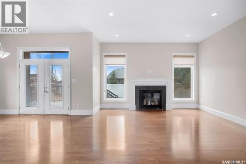 914 Paton Bay, Saskatoon, SK - Indoor Photo Showing Living Room With Fireplace