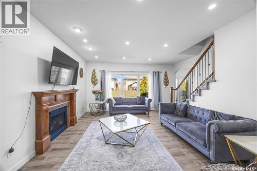 222 Stepney Crescent, Saskatoon, SK - Indoor Photo Showing Living Room With Fireplace