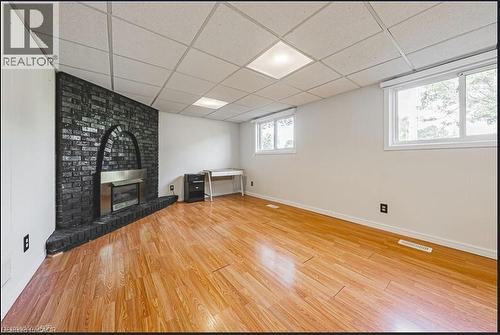 Rec Room Fireplace - 267 Erb Street E, Waterloo, ON - Indoor With Fireplace