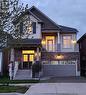 Welcoming lights in the evening. - 259 Grovehill Crescent, Kitchener, ON  - Outdoor 