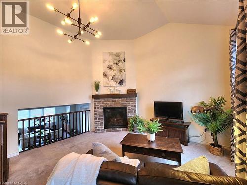 First view of the fmaily room - 259 Grovehill Crescent, Kitchener, ON - Indoor Photo Showing Living Room With Fireplace