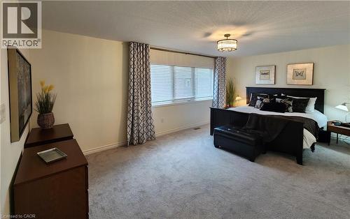 First view of the primary bedroom - 259 Grovehill Crescent, Kitchener, ON - Indoor Photo Showing Bedroom