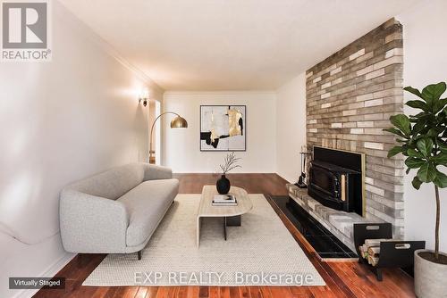 4 Leatherhead Court, Brampton, ON - Indoor Photo Showing Living Room With Fireplace