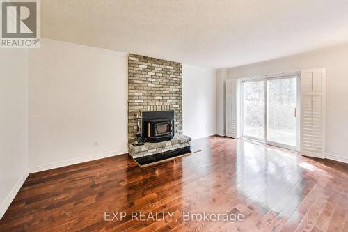 4 Leatherhead Court, Brampton, ON - Indoor Photo Showing Living Room With Fireplace