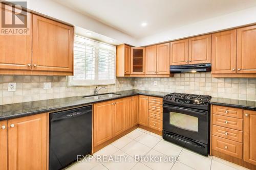 4 Leatherhead Court, Brampton, ON - Indoor Photo Showing Kitchen With Double Sink