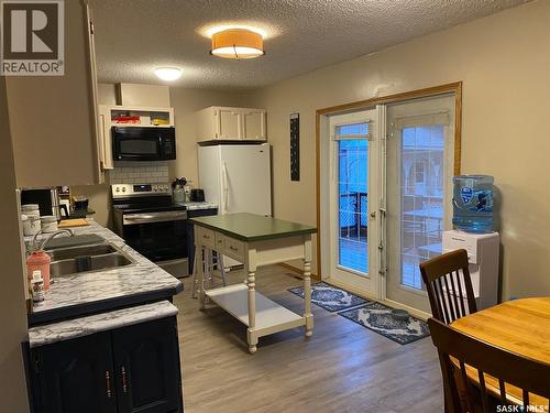 515 Springs Avenue, Springside, SK - Indoor Photo Showing Kitchen With Double Sink