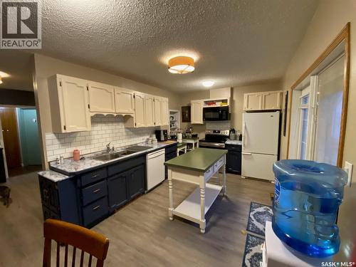 515 Springs Avenue, Springside, SK - Indoor Photo Showing Kitchen With Double Sink