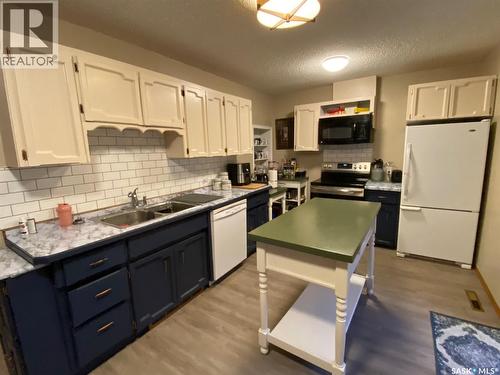 515 Springs Avenue, Springside, SK - Indoor Photo Showing Kitchen With Double Sink