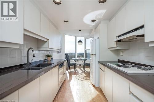 1901 Pilgrims Way Unit# 706, Oakville, ON - Indoor Photo Showing Kitchen With Double Sink