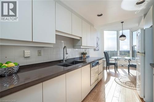 1901 Pilgrims Way Unit# 706, Oakville, ON - Indoor Photo Showing Kitchen With Double Sink