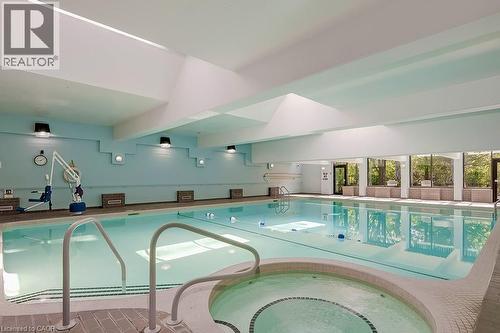 1901 Pilgrims Way Unit# 706, Oakville, ON - Indoor Photo Showing Other Room With In Ground Pool