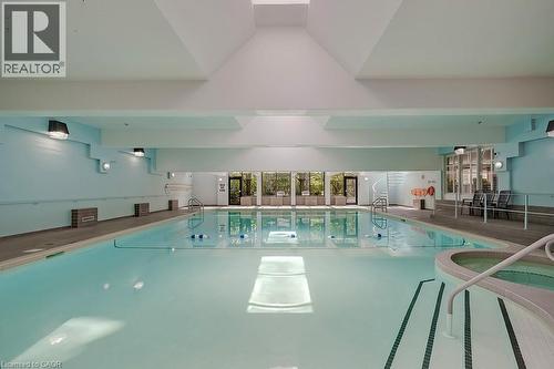 1901 Pilgrims Way Unit# 706, Oakville, ON - Indoor Photo Showing Other Room With In Ground Pool