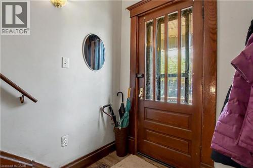 2nd Floor Entrance with Solid wood entry door with multiple glass lites and dark wood trim - 30 Hohner Avenue, Kitchener, ON - Indoor Photo Showing Other Room