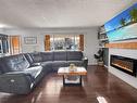 109 Noonan Drive, Brandon, MB  - Indoor Photo Showing Living Room With Fireplace 
