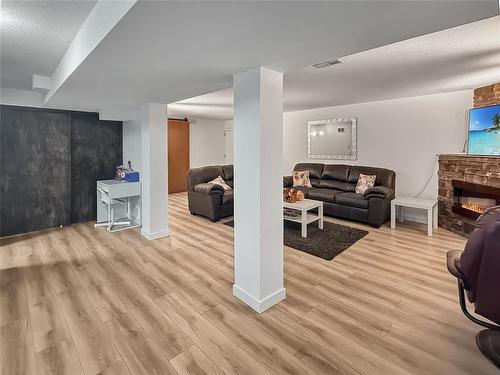 109 Noonan Drive, Brandon, MB - Indoor With Fireplace