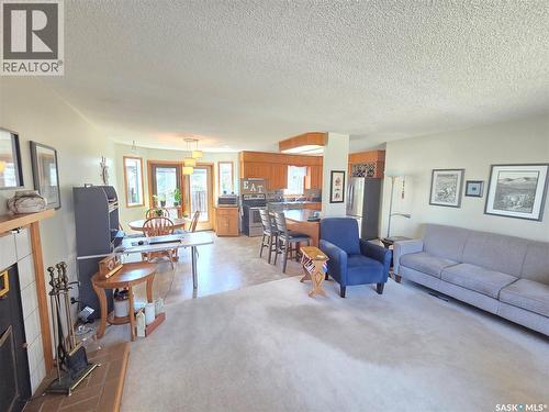 509 Carlyle Avenue, Carlyle, SK - Indoor Photo Showing Living Room With Fireplace