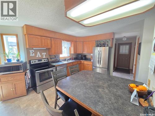 509 Carlyle Avenue, Carlyle, SK - Indoor Photo Showing Kitchen With Stainless Steel Kitchen With Double Sink