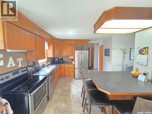 509 Carlyle Avenue, Carlyle, SK - Indoor Photo Showing Kitchen With Double Sink