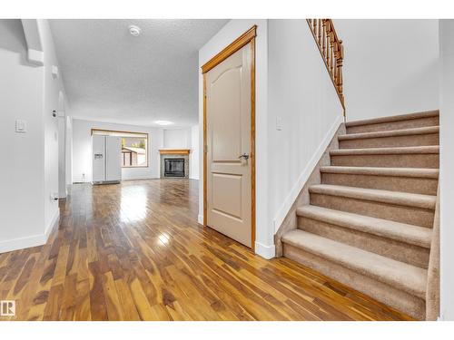 10621 175A Av Nw, Edmonton, AB - Indoor Photo Showing Other Room With Fireplace
