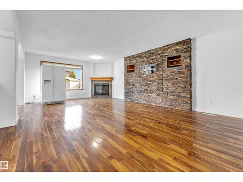 10621 175A Av Nw, Edmonton, AB - Indoor Photo Showing Living Room With Fireplace