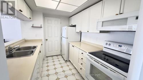 Kitchen - 2012 - 101 Subway Crescent, Toronto, ON - Indoor Photo Showing Kitchen With Double Sink