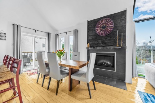 Salle à manger - 1960 Rue Du Skieur, Sainte-Adèle, QC - Indoor Photo Showing Dining Room With Fireplace
