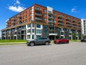Front of Structure - 702-125 Rue Des Marronniers, Candiac, QC  - Outdoor With Facade 