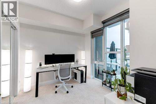 2nd Bedroom w large closet w/closet system - 16 Concord Place Unit# 123, Grimsby, ON - Indoor Photo Showing Office