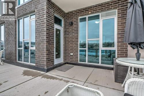 Walk-out to 385 Sq. Ft. Terrace. - 16 Concord Place Unit# 123, Grimsby, ON - Outdoor