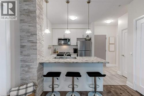 16 Concord Place Unit# 123, Grimsby, ON - Indoor Photo Showing Kitchen With Upgraded Kitchen