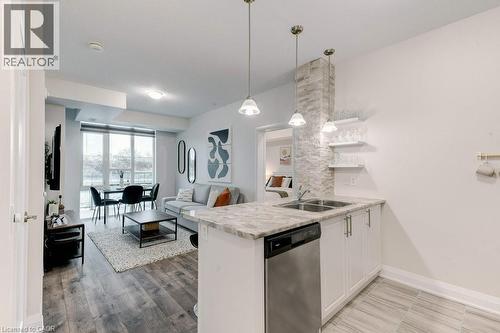 16 Concord Place Unit# 123, Grimsby, ON - Indoor Photo Showing Kitchen With Double Sink