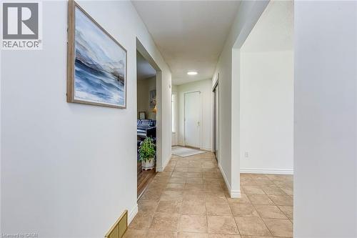 Foyer featuring neutral tile flooring, white walls, and a recessed ceiling light - 43 Niska Drive, Waterdown, ON - Indoor Photo Showing Other Room