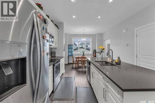 219 Newton Link, Saskatoon, SK - Indoor Photo Showing Kitchen With Stainless Steel Kitchen With Double Sink