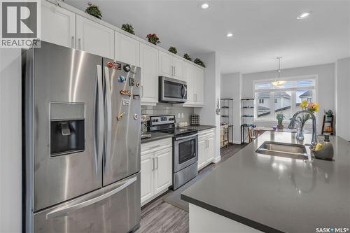 219 Newton Link, Saskatoon, SK - Indoor Photo Showing Kitchen With Stainless Steel Kitchen With Double Sink With Upgraded Kitchen
