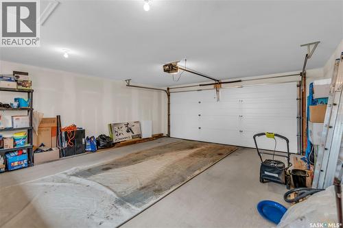 219 Newton Link, Saskatoon, SK - Indoor Photo Showing Garage