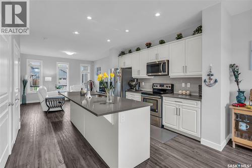 219 Newton Link, Saskatoon, SK - Indoor Photo Showing Kitchen With Stainless Steel Kitchen With Double Sink With Upgraded Kitchen