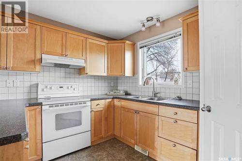 1426B C Avenue N, Saskatoon, SK - Indoor Photo Showing Kitchen With Double Sink