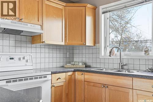 1426B C Avenue N, Saskatoon, SK - Indoor Photo Showing Kitchen With Double Sink