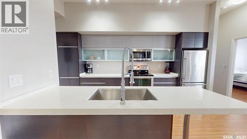 312 235 Evergreen Square, Saskatoon, SK - Indoor Photo Showing Kitchen With Stainless Steel Kitchen With Double Sink