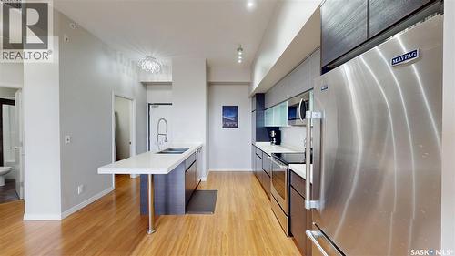 312 235 Evergreen Square, Saskatoon, SK - Indoor Photo Showing Kitchen With Stainless Steel Kitchen With Double Sink With Upgraded Kitchen