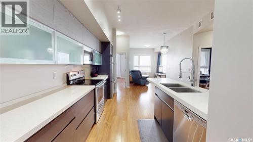 312 235 Evergreen Square, Saskatoon, SK - Indoor Photo Showing Kitchen With Double Sink With Upgraded Kitchen