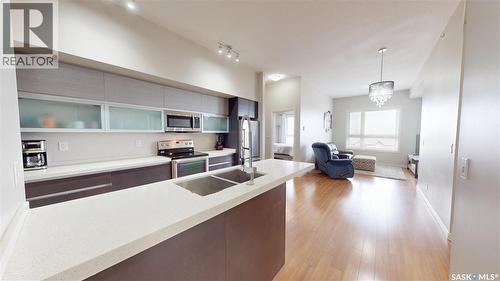 312 235 Evergreen Square, Saskatoon, SK - Indoor Photo Showing Kitchen With Double Sink With Upgraded Kitchen