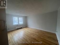 Bright living room - freshly painted & hardwood - 