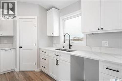 10 Jesse Bay, Last Mountain Lake, SK - Indoor Photo Showing Kitchen With Double Sink