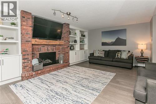 Gas fireplace - 1774 Old Mill Road, Kitchener, ON - Indoor Photo Showing Living Room With Fireplace