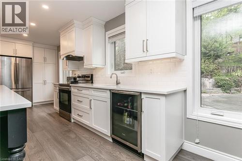 Bar sink and refridgerator - 1774 Old Mill Road, Kitchener, ON - Indoor Photo Showing Kitchen With Upgraded Kitchen