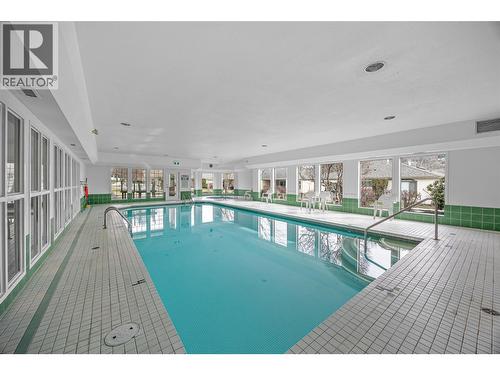 615 Glenmeadows Road Unit# 49, Kelowna, BC - Indoor Photo Showing Other Room With In Ground Pool