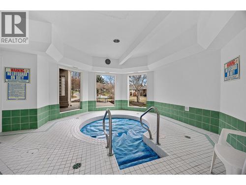 615 Glenmeadows Road Unit# 49, Kelowna, BC - Indoor Photo Showing Other Room With In Ground Pool