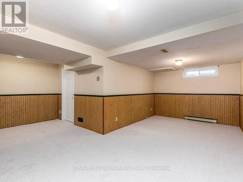 L shaped recroom with new carpets. - 80 - 22C Maple Ridge Crescent, Ottawa, ON - Indoor